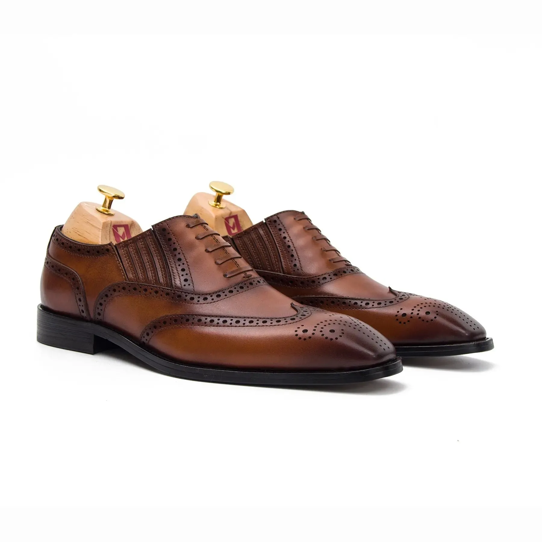 Brown wingtip dress shoes