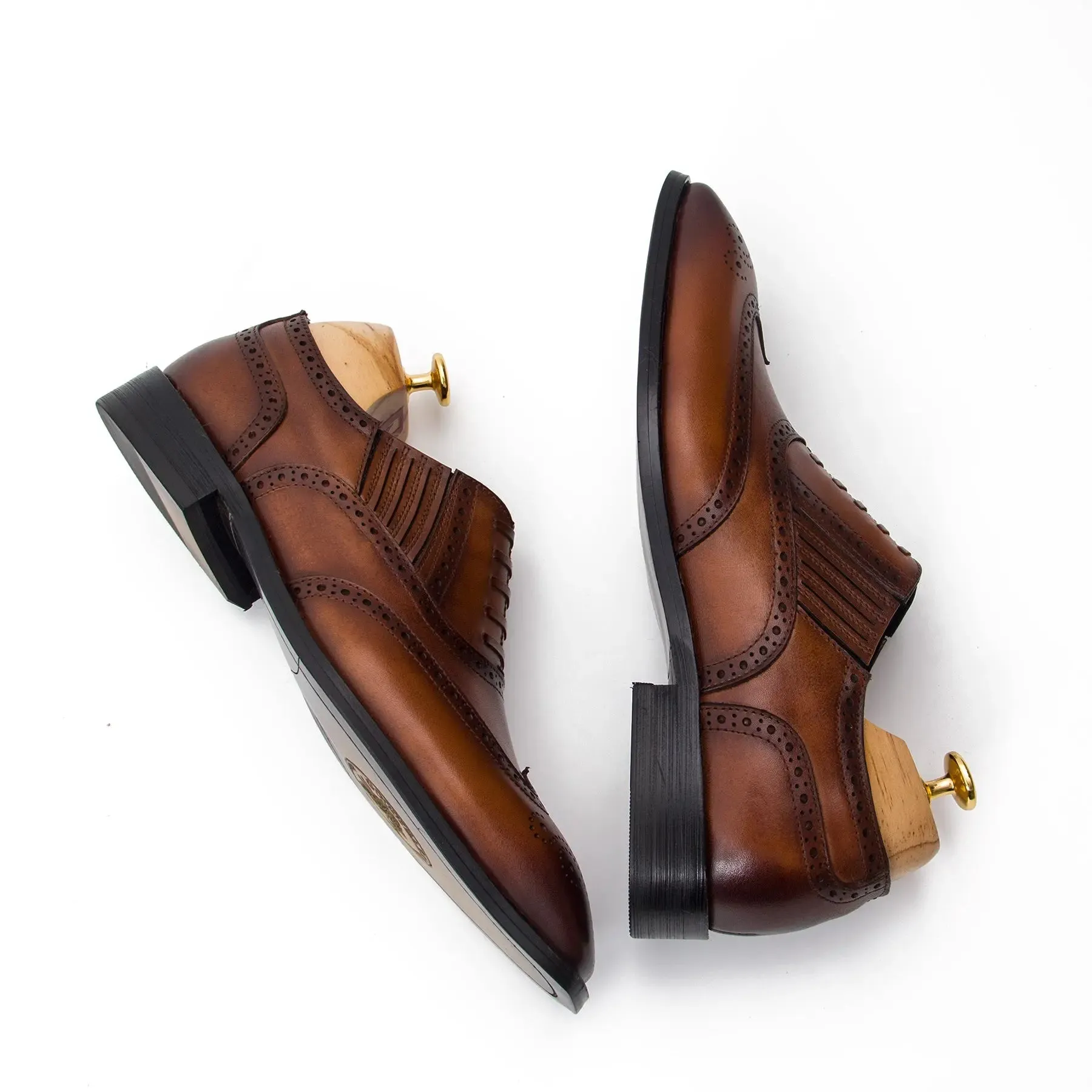 Brown wingtip dress shoes